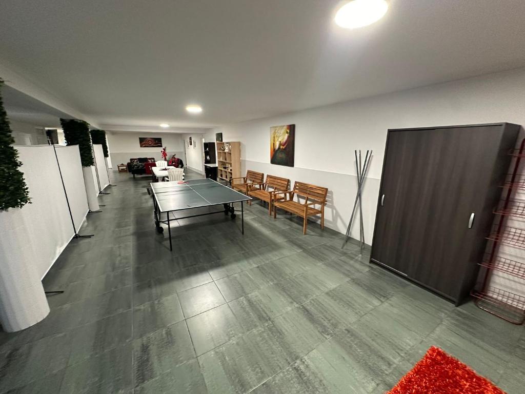 Zona de convívio e lazer do Alojamento Rio Neiva